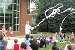 Ohio students enjoy the Mean Green Science Machine demonstration, part of Cleveland Public Library, Case Western Reserve University, and Ohio State University’s science literacy collaboration. Photo courtesy of Ohio State University