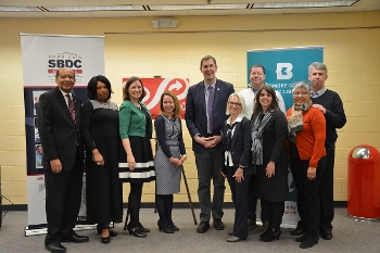 Entrepreneur Academy partners (l.-r.): William Freeman and Sandra Conaway, SBDC Corridor Region; Robin McKinney, CASH Campaign of Maryland; Heidi Daniel, EPFL; John A. Olszewski Jr., Baltimore County Executive; Paula Miller, Director, BCPL; Darren Peyton, SBDC Northern Region; Amy Wallace Yingling, Regional Director, SBDC Northern Region; EPFL Board member Lidia Paz-Baker; Michael Netzer, BCPL Board of Trustees. Photo by BCPL