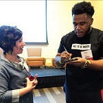 Christy Estrovitz, SFPL, with Jammal Lemy, March for Our Lives at LJ's annual Public Library Think Tank event