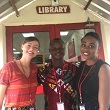 Kate Davis with her library staff, Mr. Wisdom and Ms. Tolani