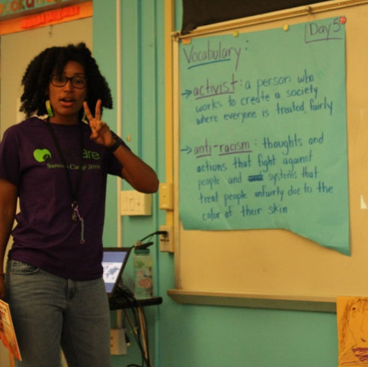 woman teaching anti-racism vocabulary